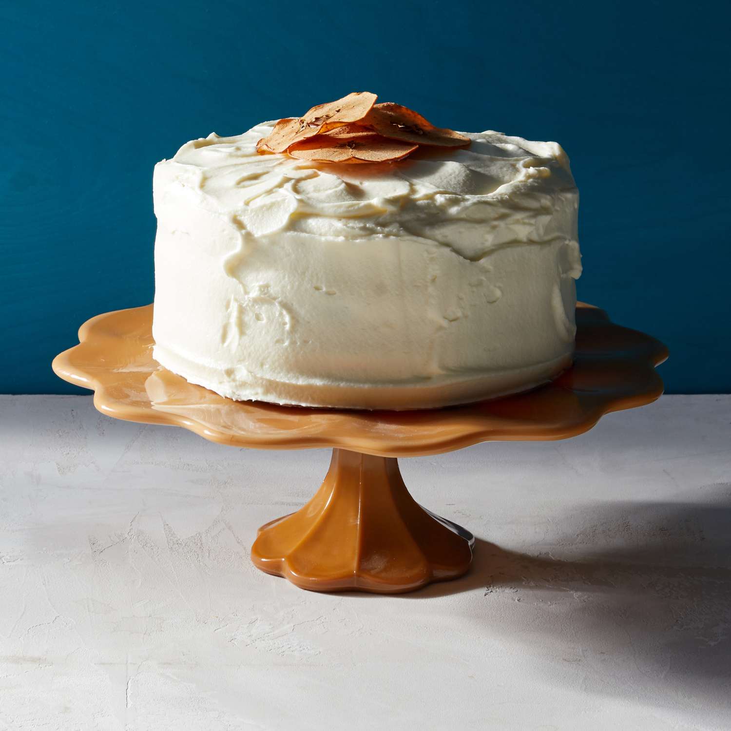 three layer apple cake on cake stand