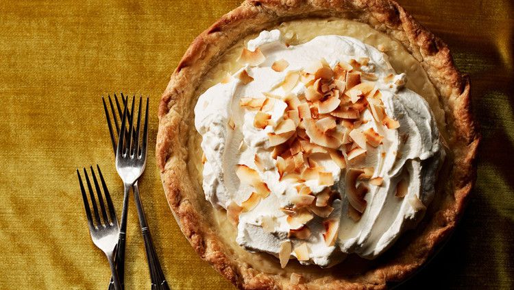 double-coconut cream pie on gold table cloth