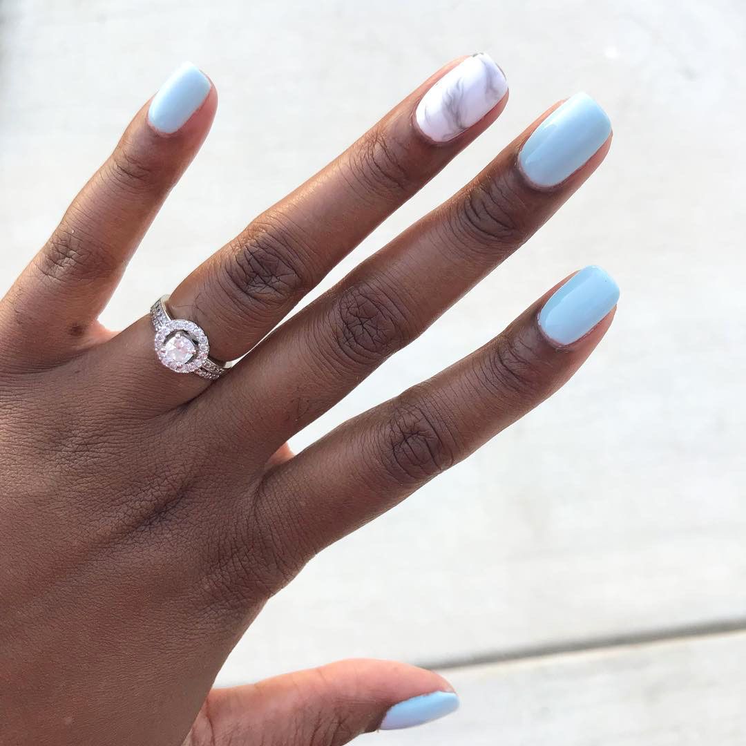 engagement ring selfie blue and marble accent manicure
