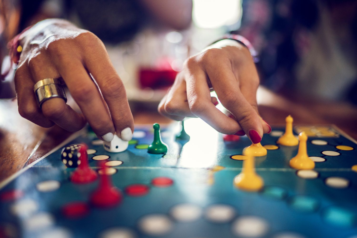 people playing board game