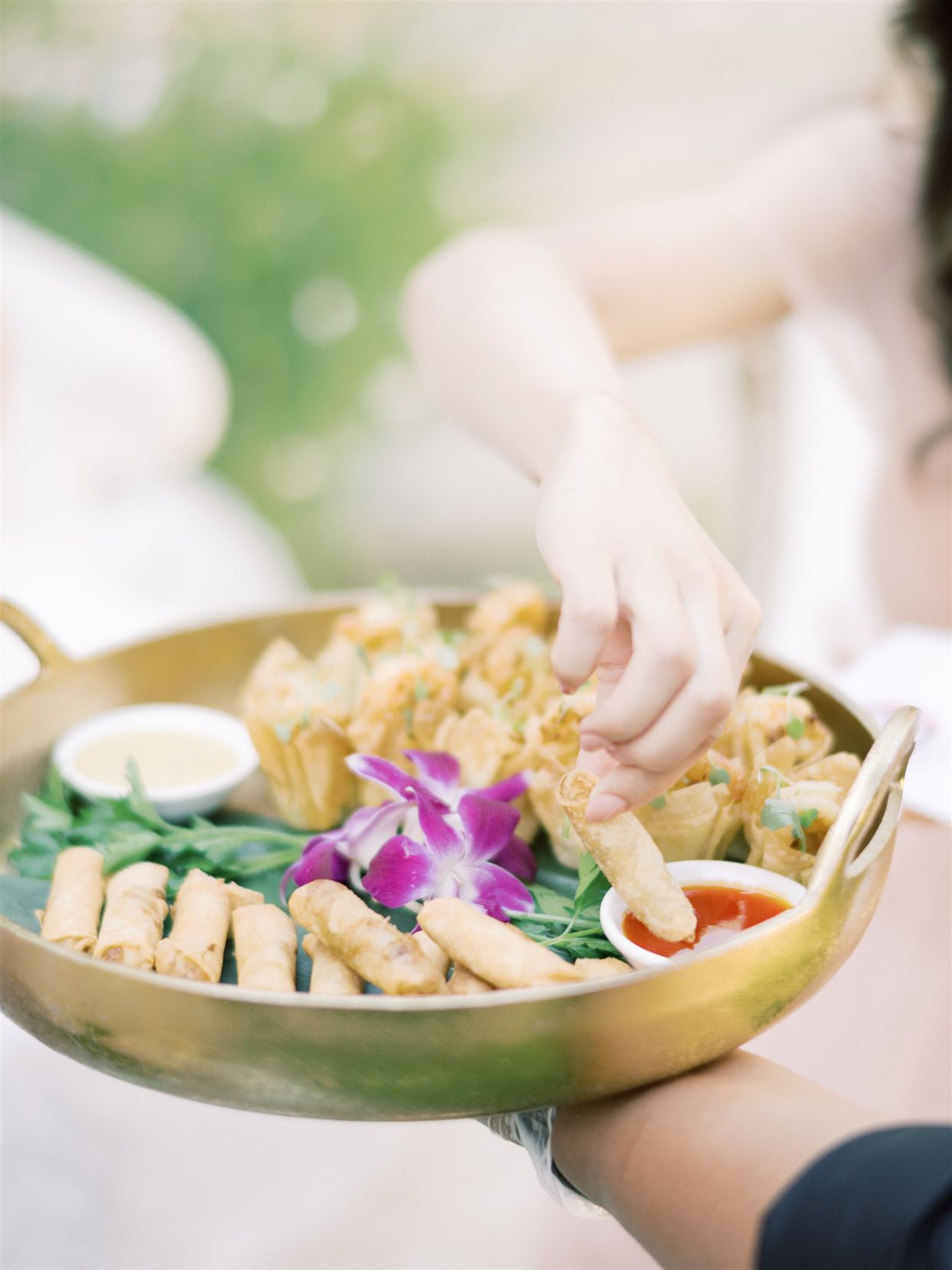 spring rolls on serving tray wedding reception food