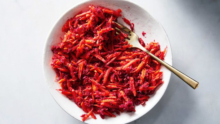 carrot beet horseradish sauce in white bowl