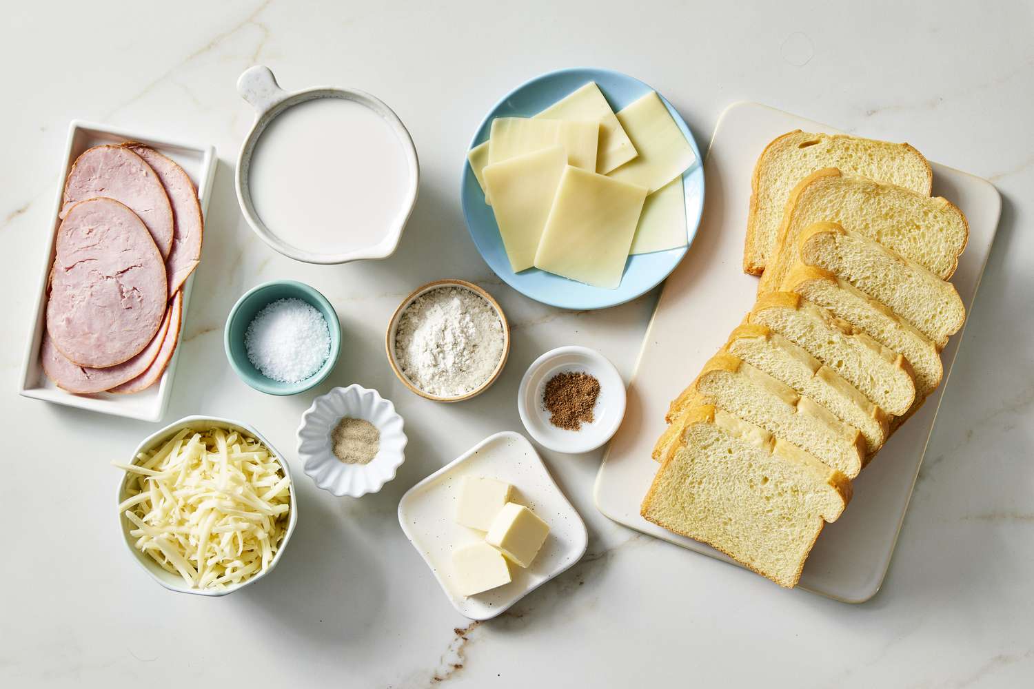 Ingredients for croque monsieur, ham, bread, cheese, salt