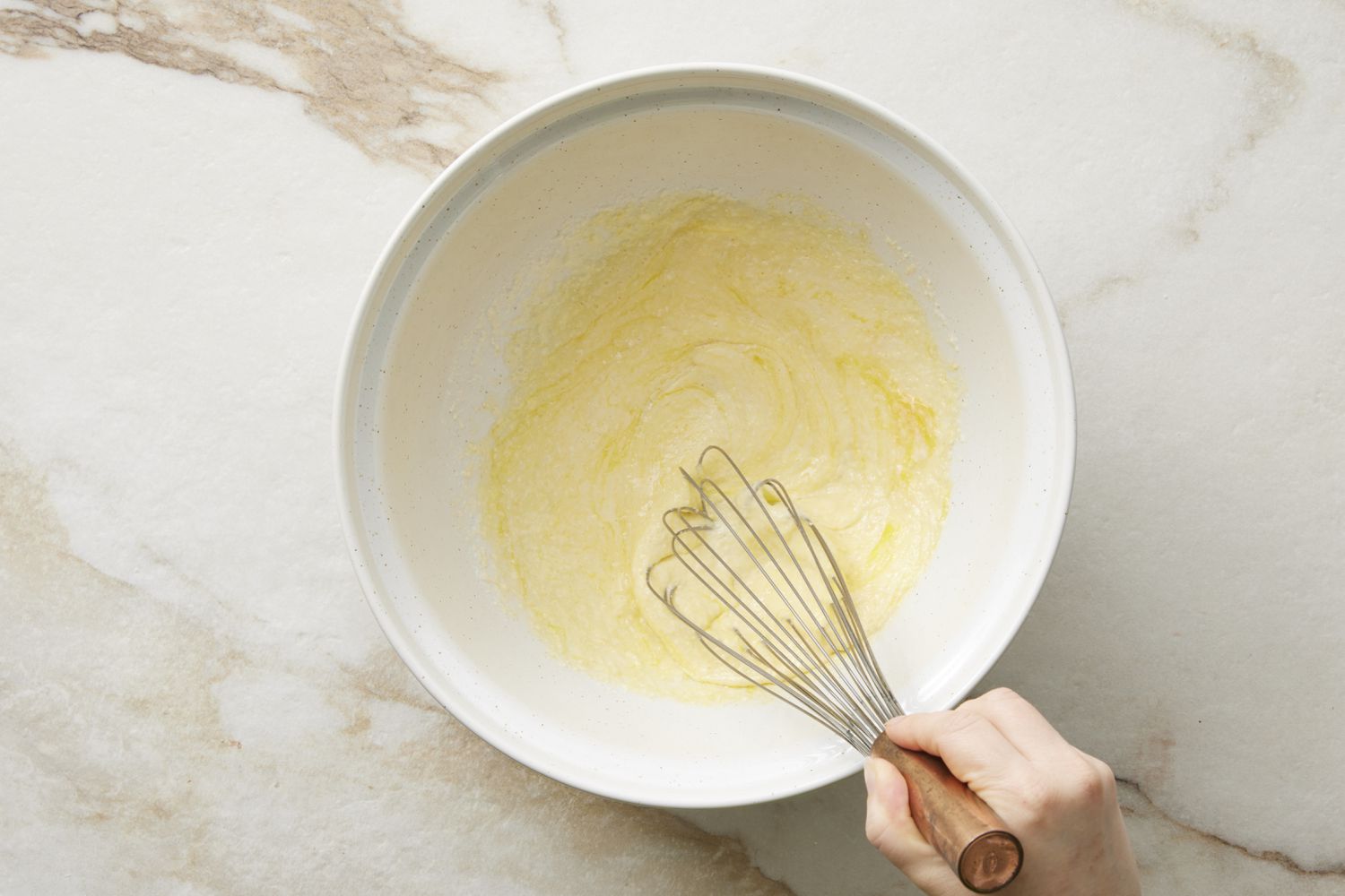 Egg, cheese, cream in a bowl