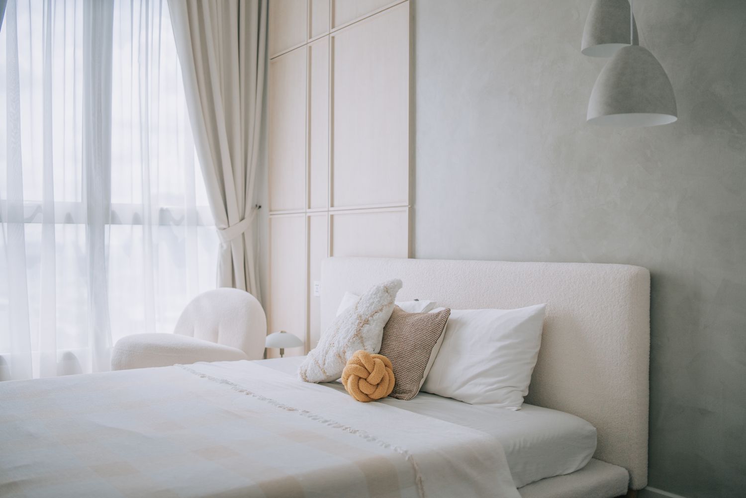 Bedroom with layered curtains