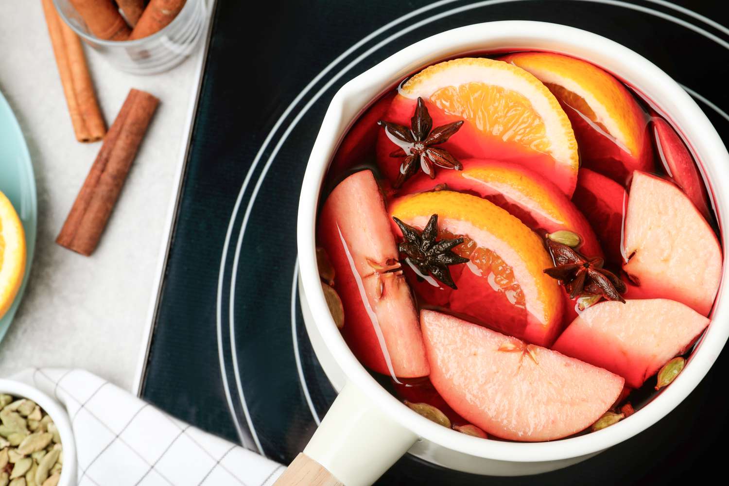 Apples, Citrus, Cloves and Cinnamon on stove for kitchen aroma