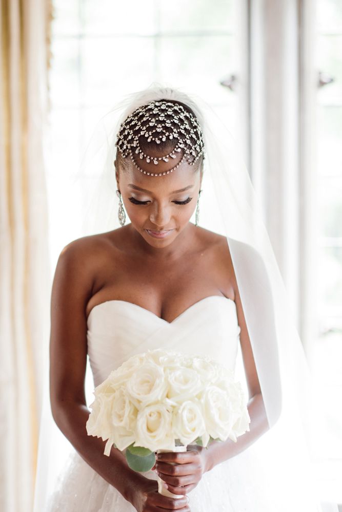 bride with sleek updo and headpiece