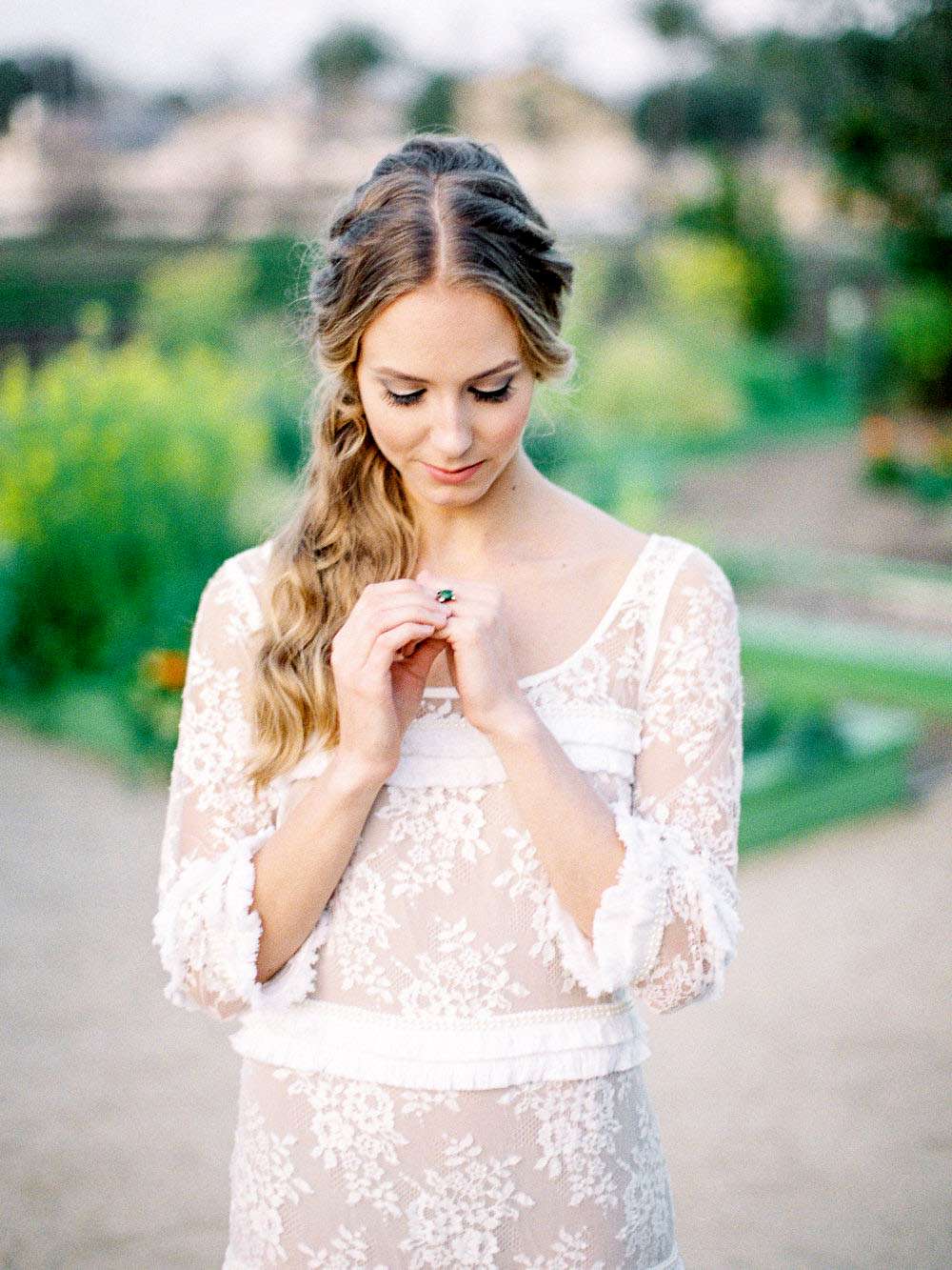 boho bride with twisted side-swept hairstyle