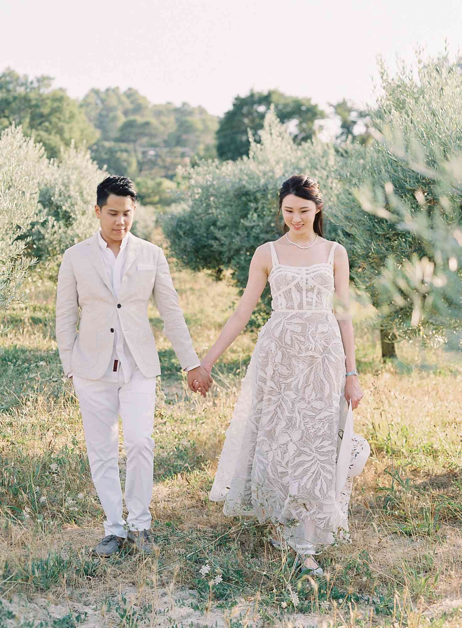 janet patrick rehearsal dinner couple walking in nature
