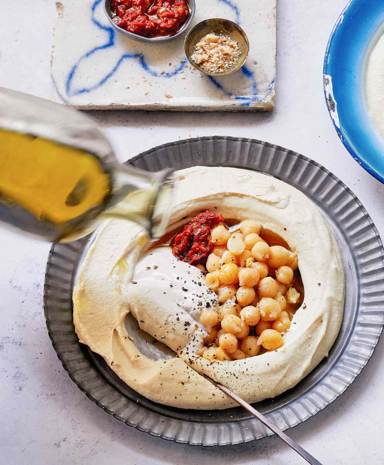 mixing perfectly balanced hummus