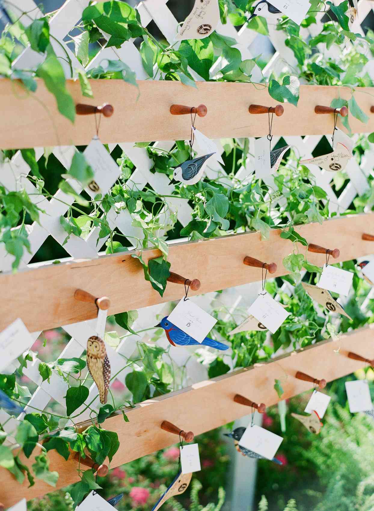 wooden hangers with bird escort cards