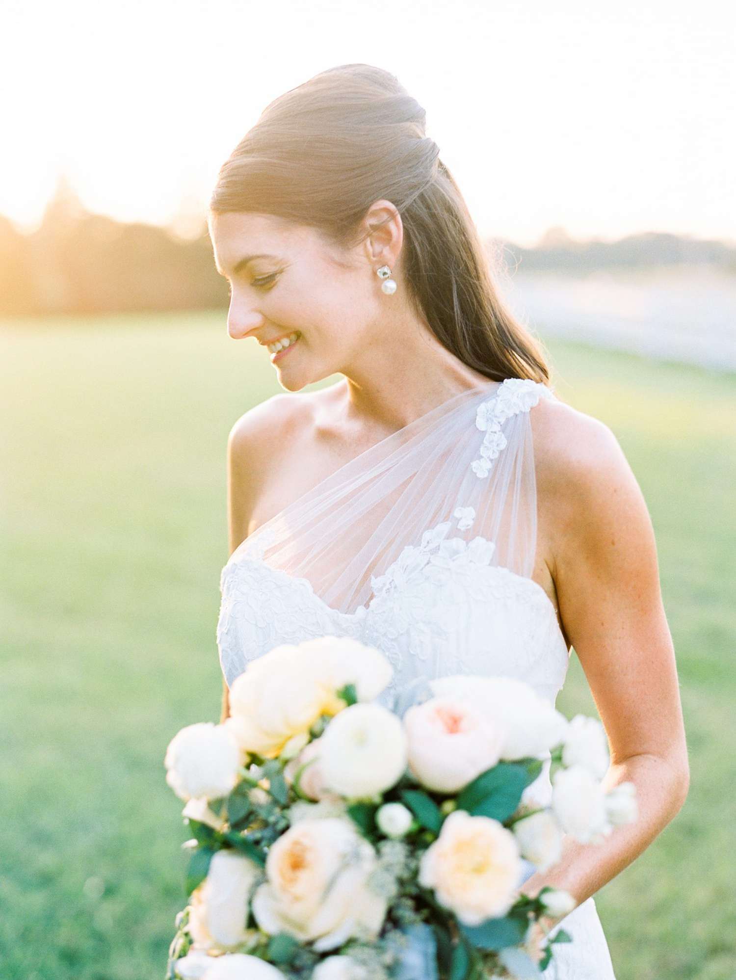 bride wearing simple earrings