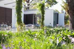 Patio and garden in rear of modern home