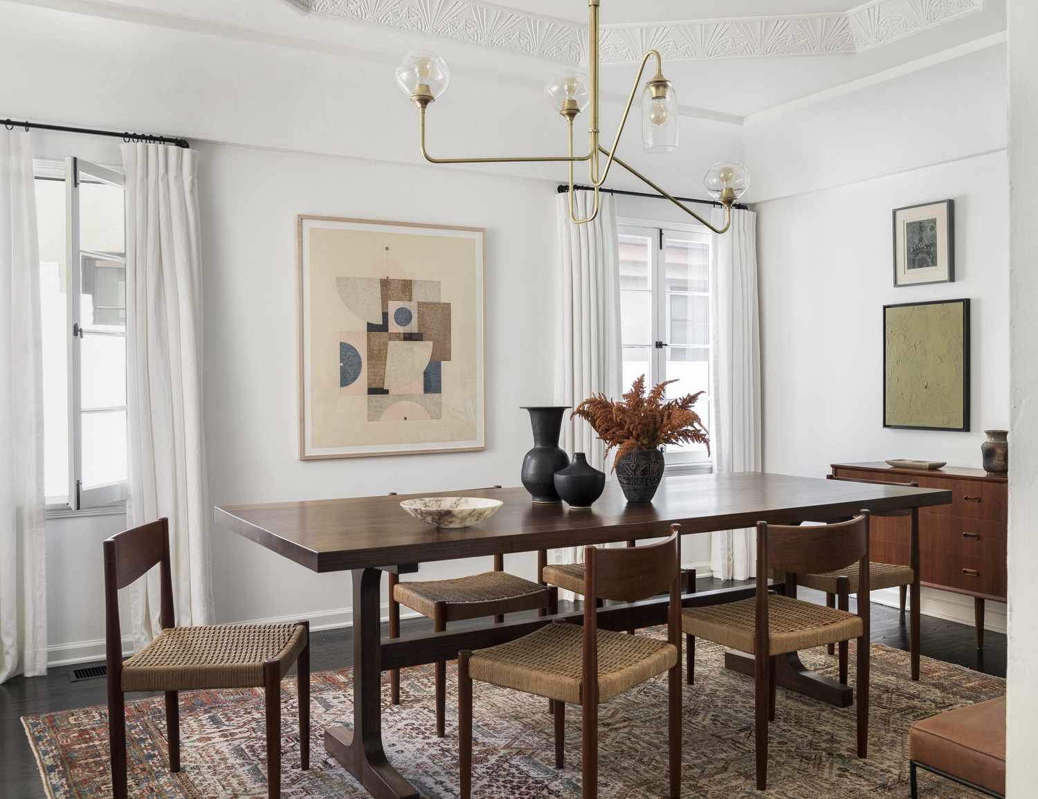 dining room table art and statement lighting