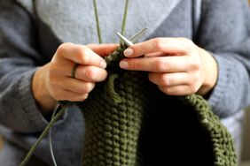 woman hands knitting
