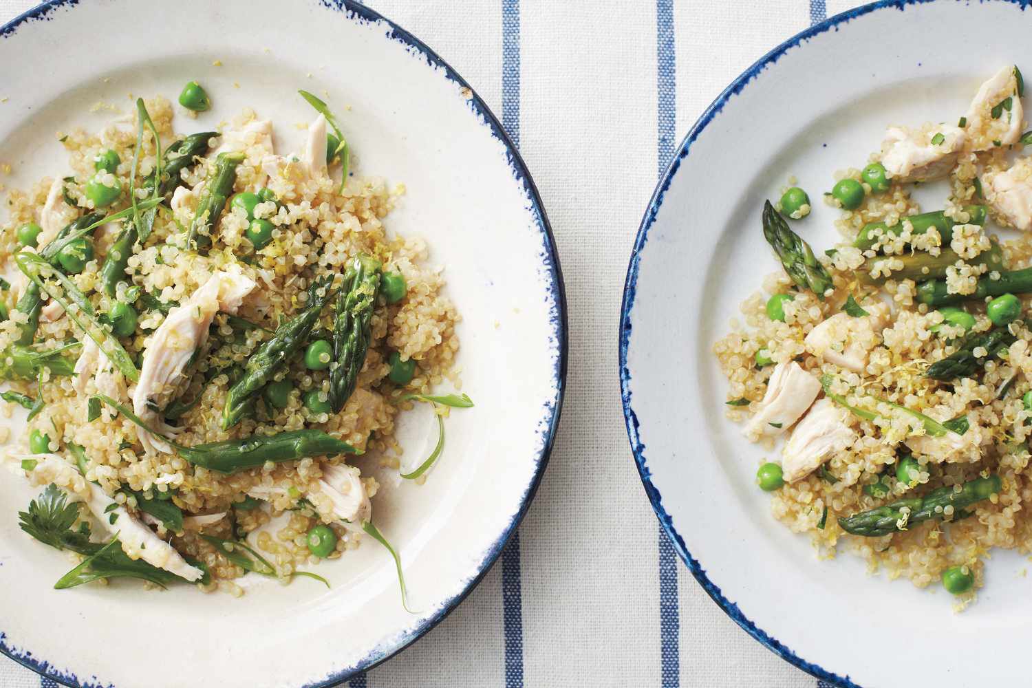 warm quinoa and chicken salad on plates