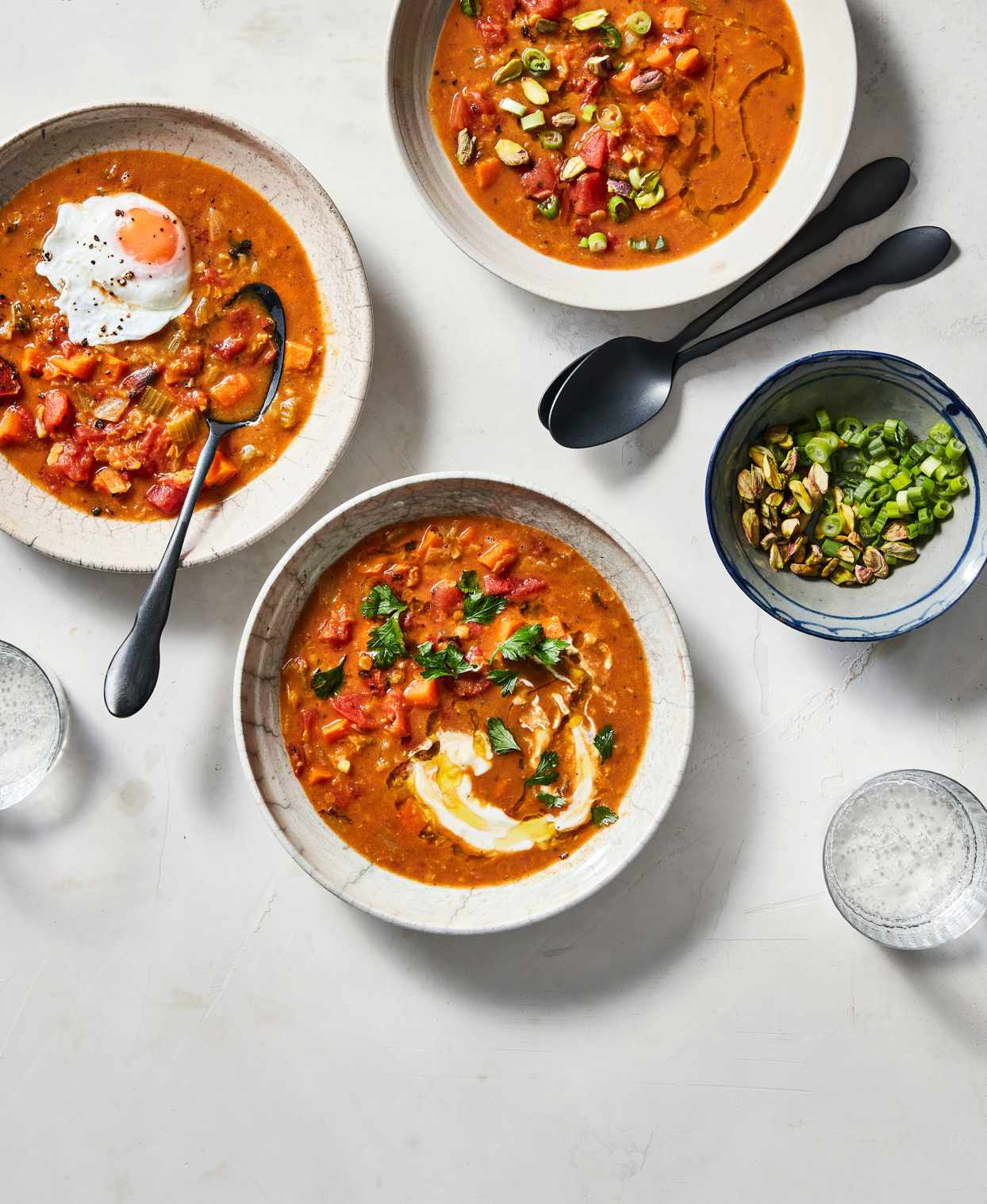 creamy lentil stew topped with fried egg