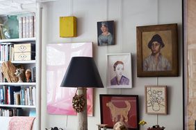 collection of wall art featuring different subjects, shapes, and sizes