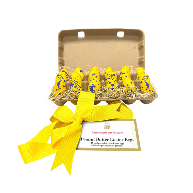 Gift box of peanut butter Easter eggs tied with a yellow ribbon
