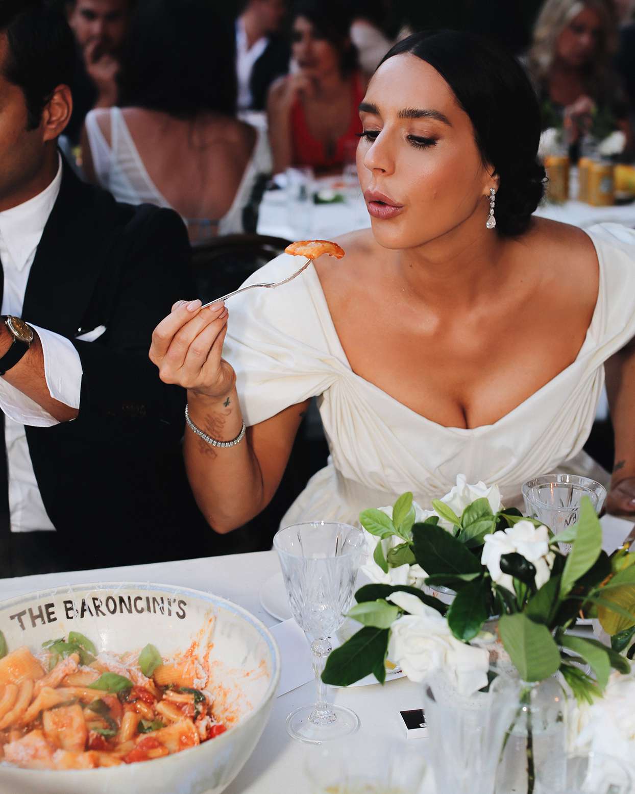 pia davide wedding dinner bride eating pasta