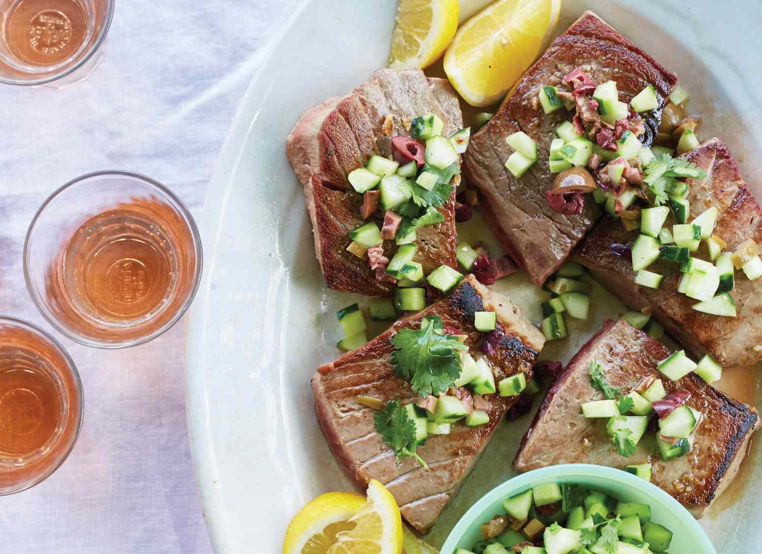 overhead view of tuna with relish and rose wine