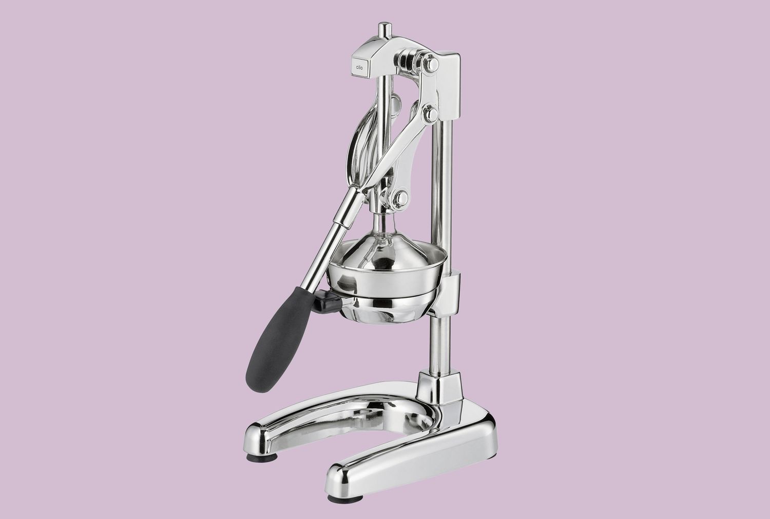 Metallic manual juicer with a pressing lever on a light background