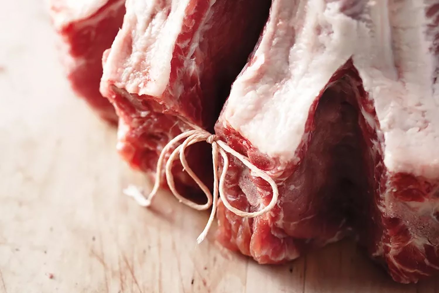 close up of a pork roast tied with string