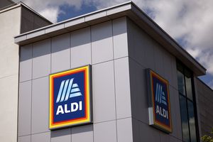 Exterior of an Aldi supermarket showing its logo on the building wall