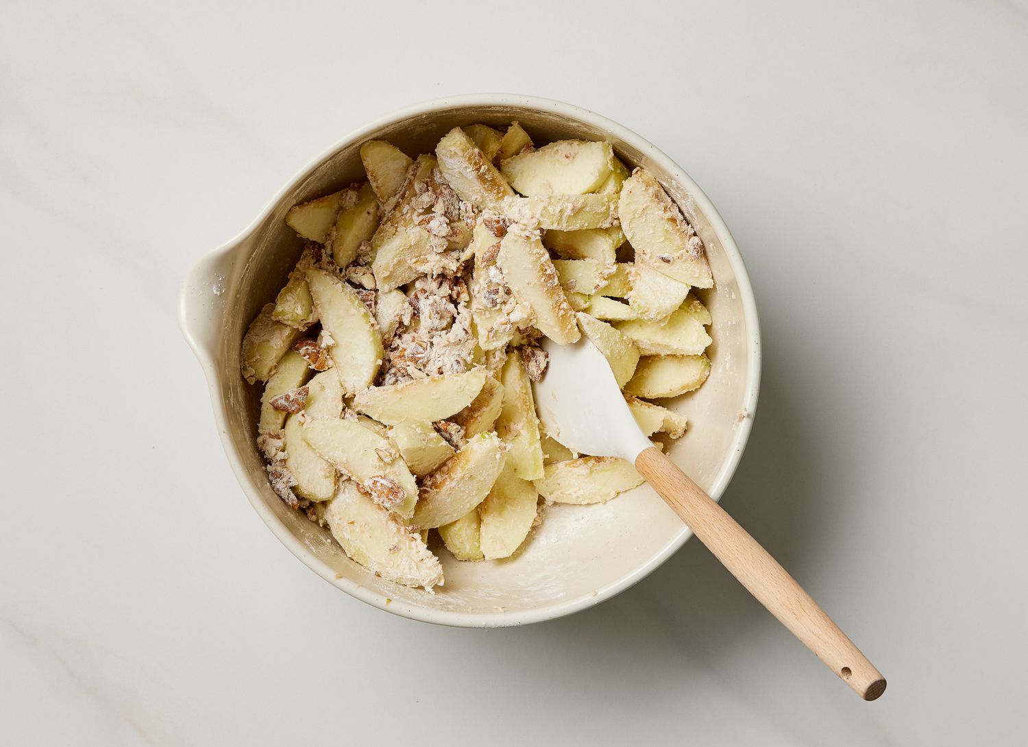 overhead view of apple pie mixture in bowl
