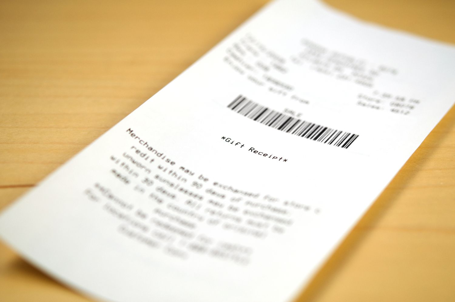 gift receipt on a table. Selective focus on the word "Gift Receipt".