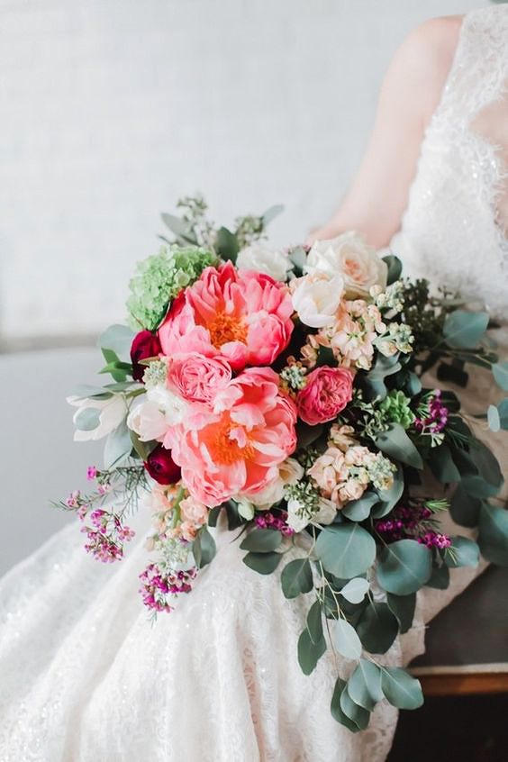 vibrant coral charm peony bouquet with muted greenery