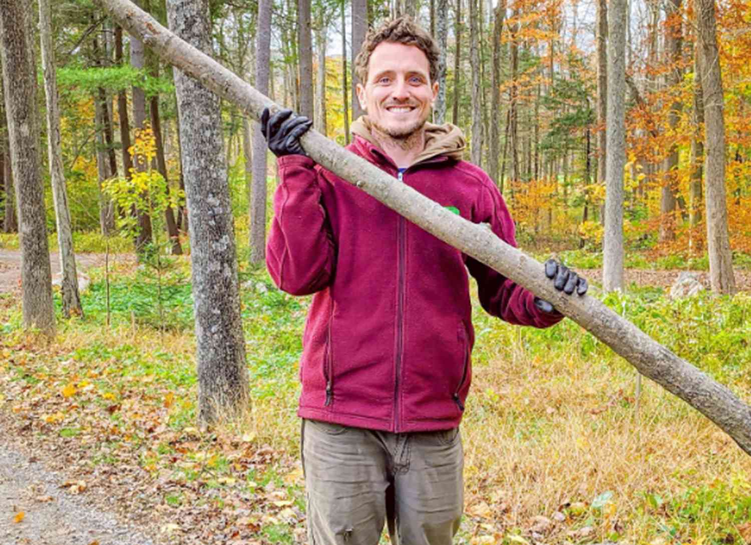 Ryan McCallister, gardener with large branch