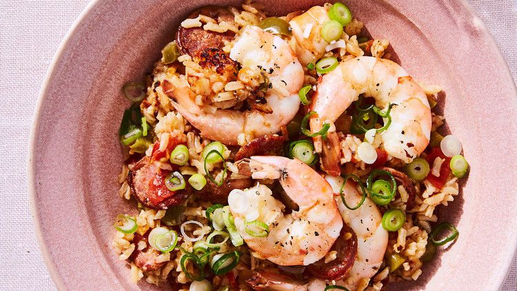 cajun shrimp and rice in pink bowl