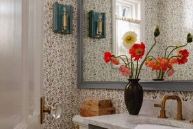bathroom with floral wallpaper