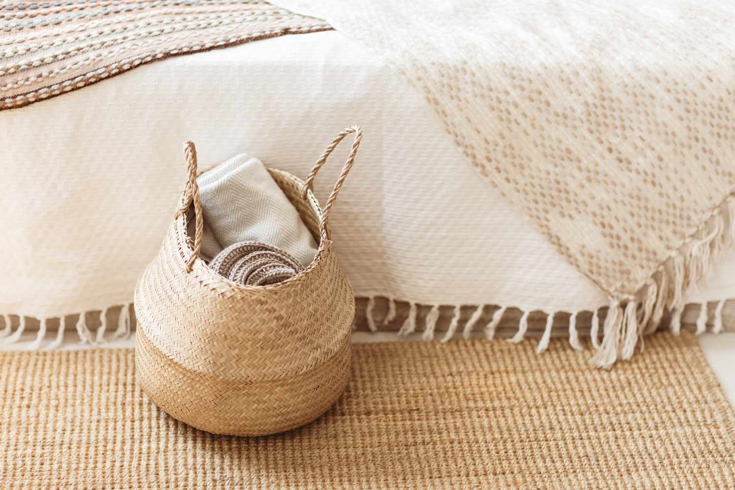 white room with throw blankets