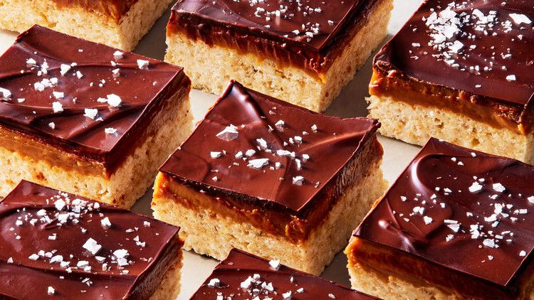 chocolate-peanut-butter-caramel cereal bars topped with flaky sea salt