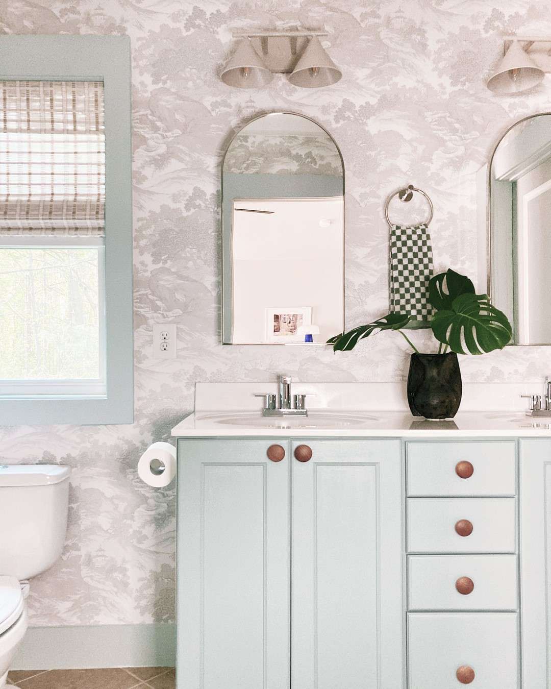 Bathroom with toile wallpaper 