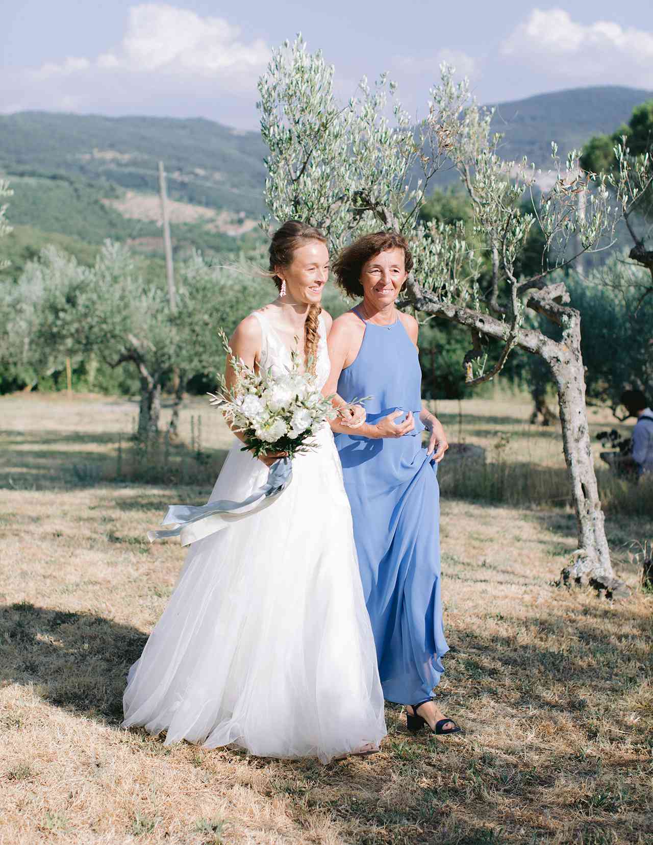 bride mother wedding day outdoor walk