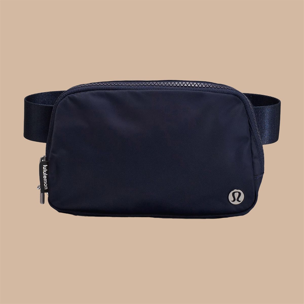 navy belt bag on a beige background