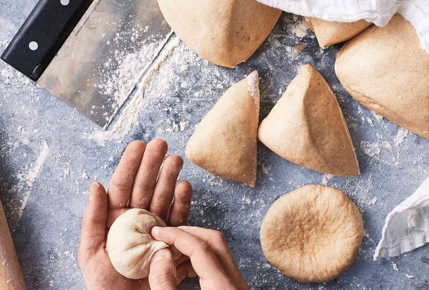 Dough being rolled and pinched
