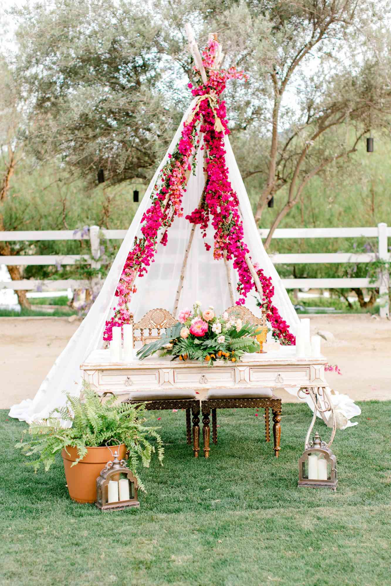 sweetheart table floral teepee with antique display