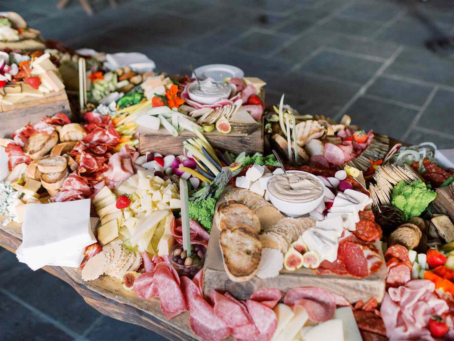elaborate grazing table at wedding reception