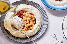 mixing perfectly balanced hummus