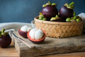 close up of cut open mangosteens fruit