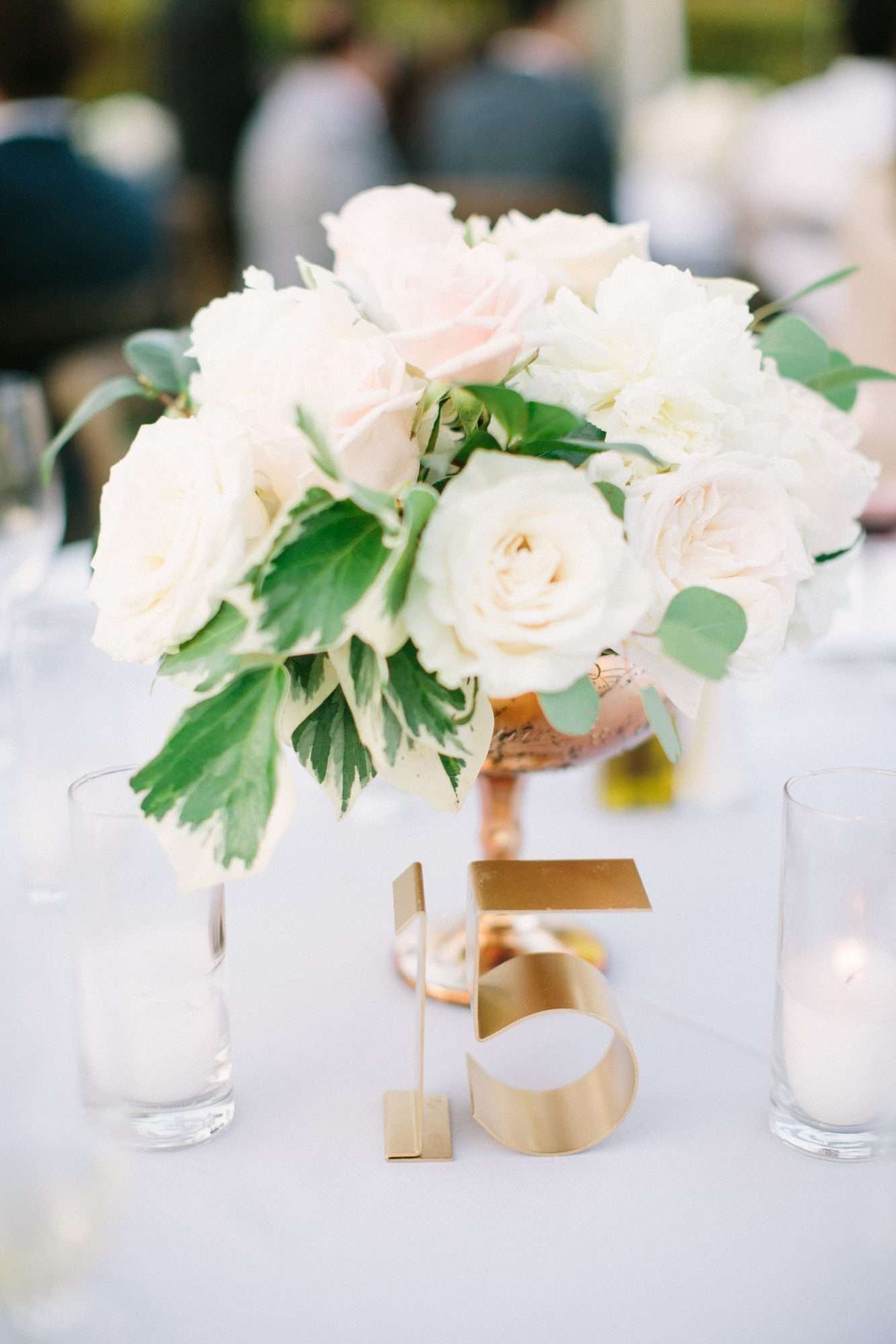Brass metal wedding table number and white wedding centerpiece