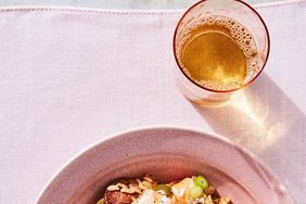 cajun shrimp and rice in pink bowl