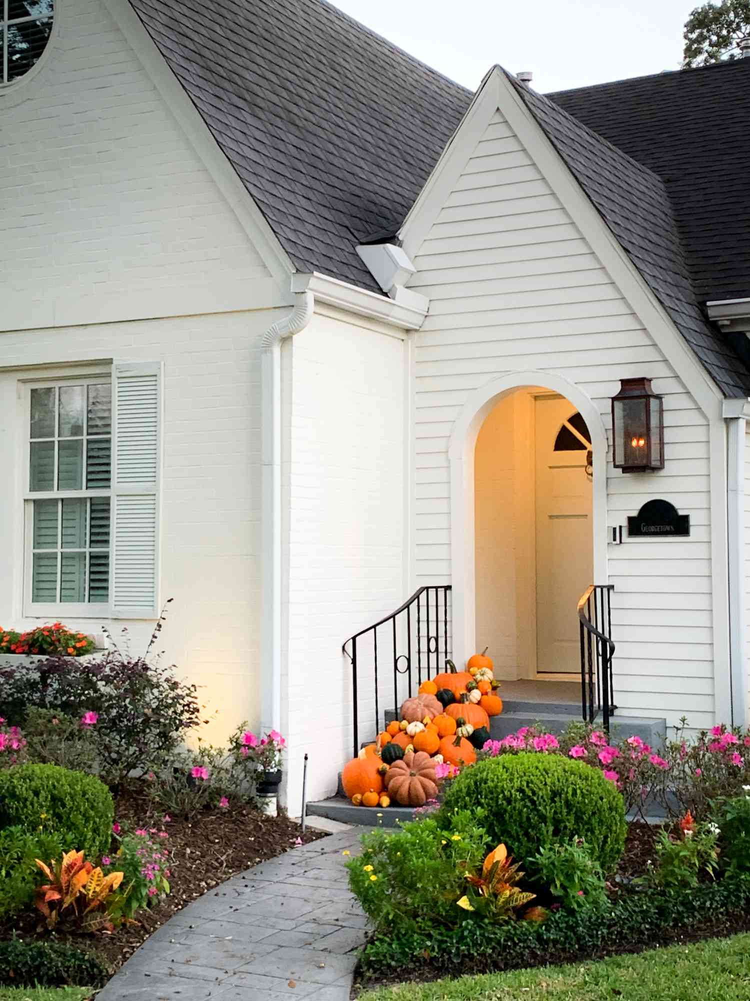 Cluster of colorful pumpkins on a fall porch