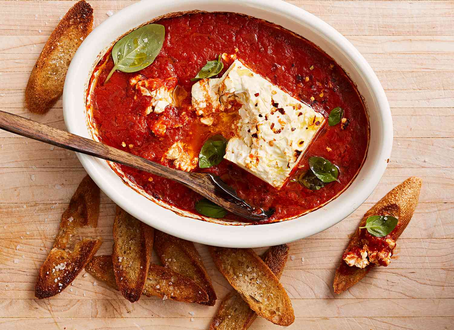 overhead view of baked feta marinara dip