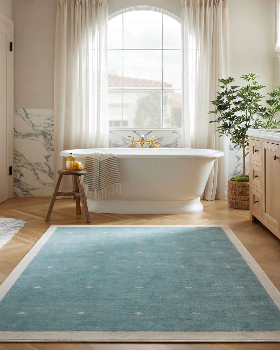 goop luna soft teal rug from Ruggable. 