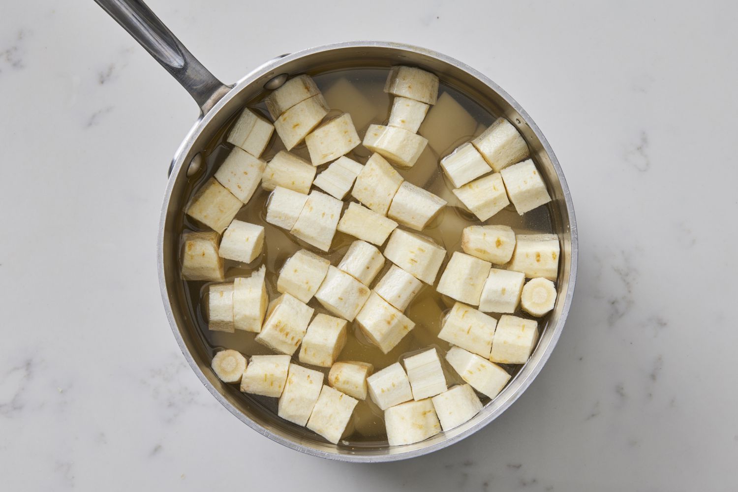Potatoes in pot with water